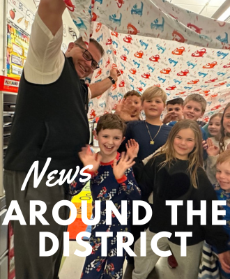  Picture of Superintendent Gallagher with a group of students